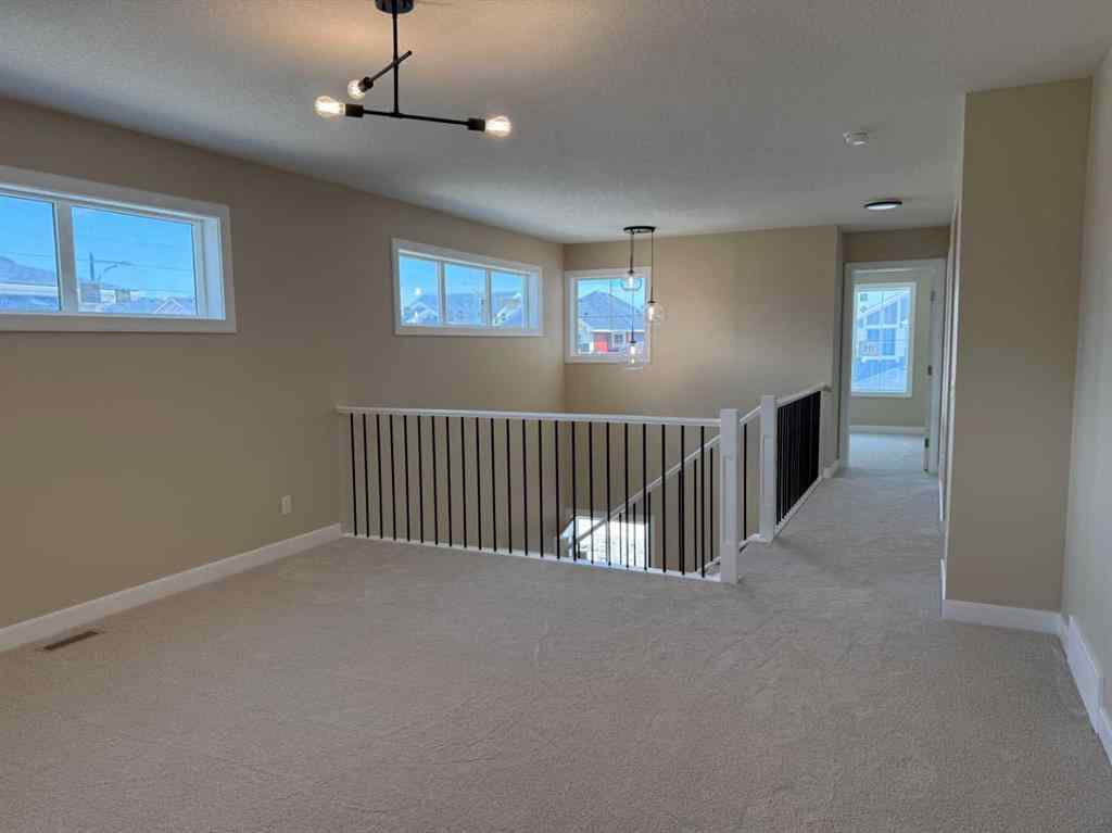MLS® A2228402 - 91 Sundown Crescent  in Sunset Ridge Cochrane, Residential