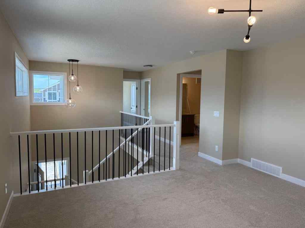 MLS® A2228402 - 91 Sundown Crescent  in Sunset Ridge Cochrane, Residential