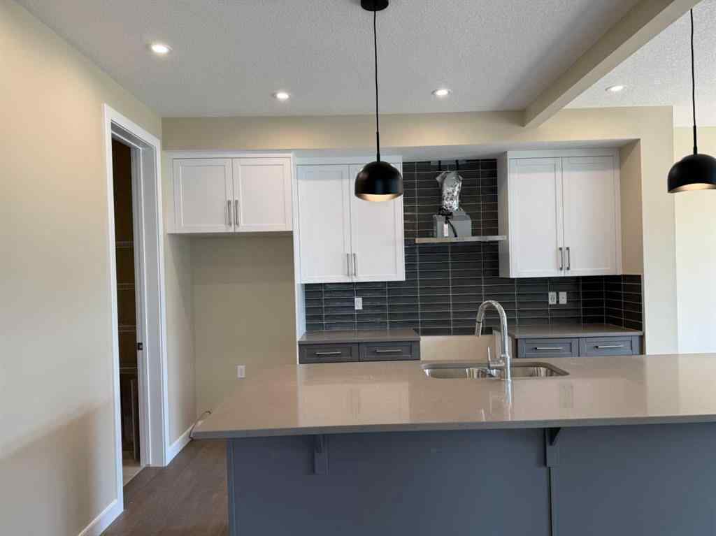 MLS® A2228402 - 91 Sundown Crescent  in Sunset Ridge Cochrane, Residential