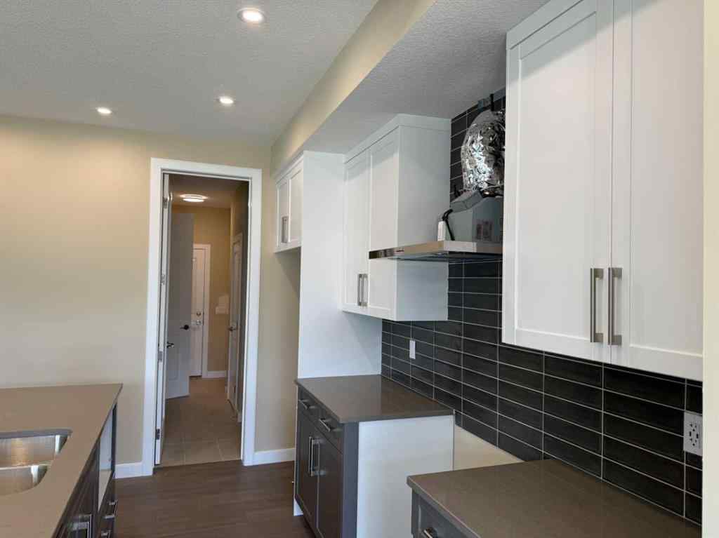 MLS® A2228402 - 91 Sundown Crescent  in Sunset Ridge Cochrane, Residential
