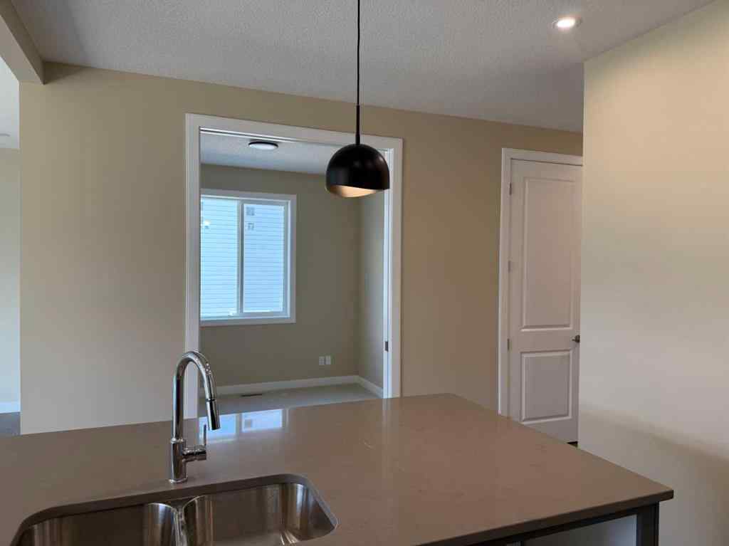 MLS® A2228402 - 91 Sundown Crescent  in Sunset Ridge Cochrane, Residential