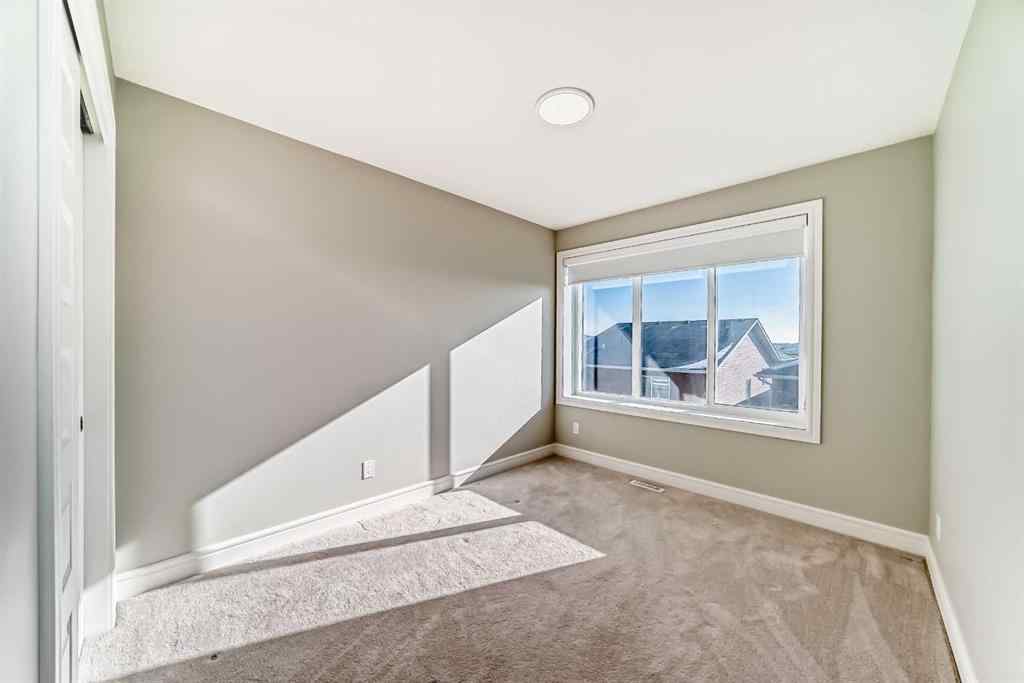 MLS® A2228742 - Unit #411 10060 46 Street NE in Saddle Ridge Calgary, Residential