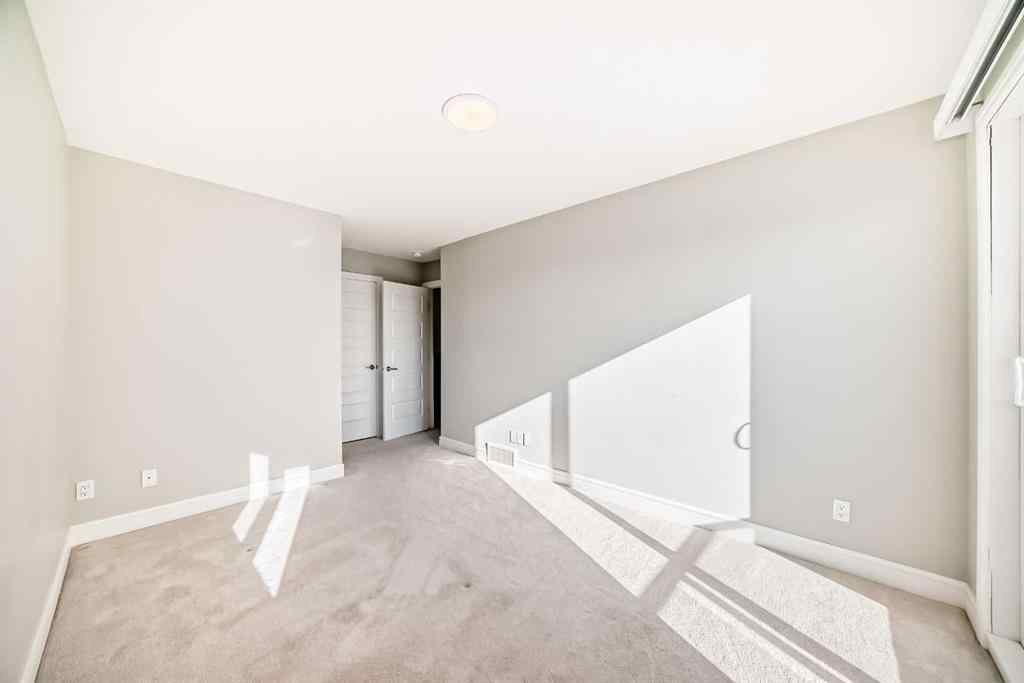 MLS® A2228742 - Unit #411 10060 46 Street NE in Saddle Ridge Calgary, Residential