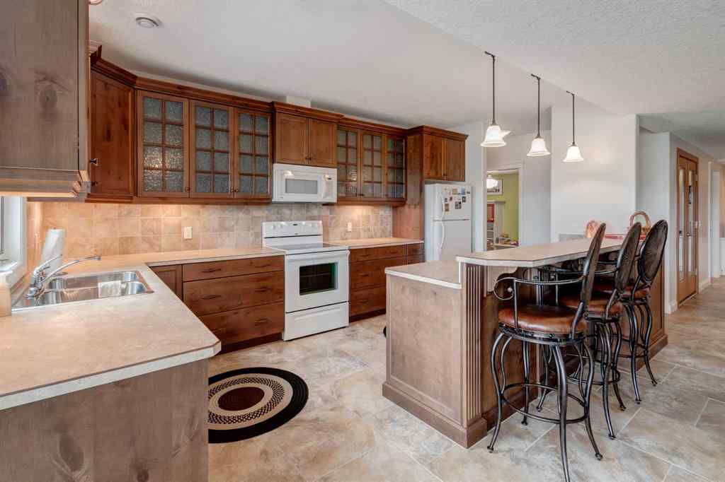 MLS® A2228910 - Unit #100 274256 272 Street W in NONE Rural Foothills County, Residential