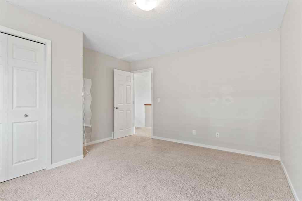MLS® A2228923 - 77 Auburn Glen Common SE in Auburn Bay Calgary, Residential