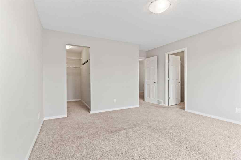 MLS® A2228923 - 77 Auburn Glen Common SE in Auburn Bay Calgary, Residential