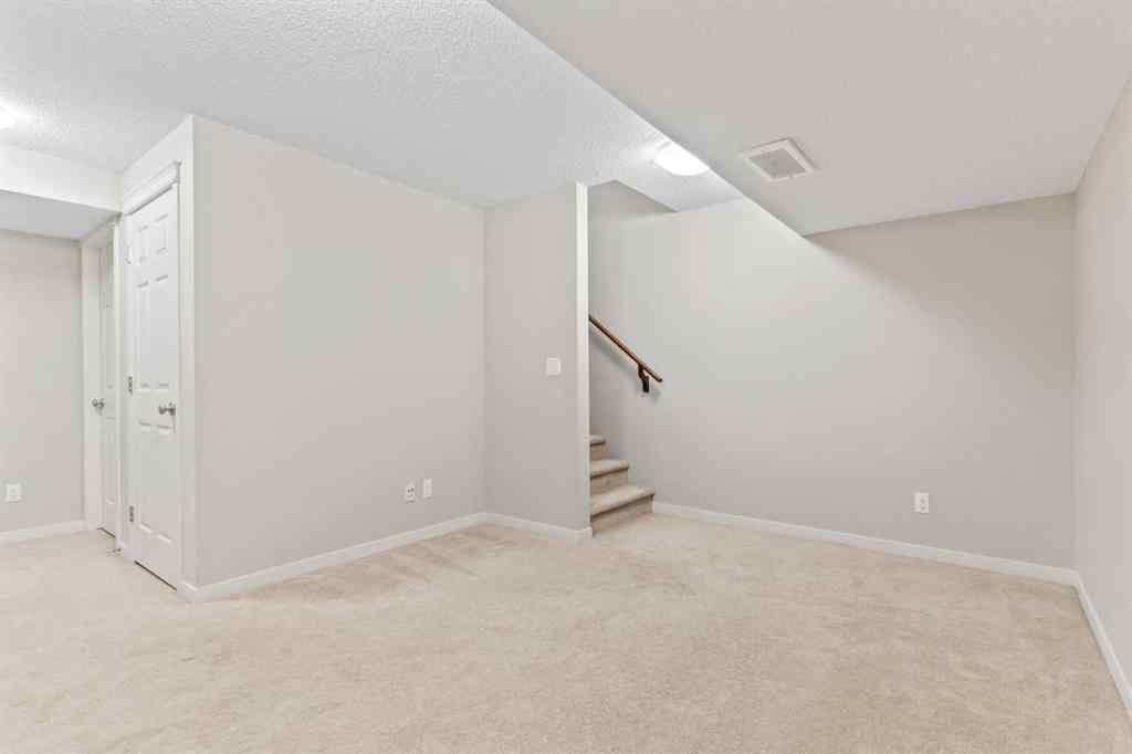MLS® A2228923 - 77 Auburn Glen Common SE in Auburn Bay Calgary, Residential