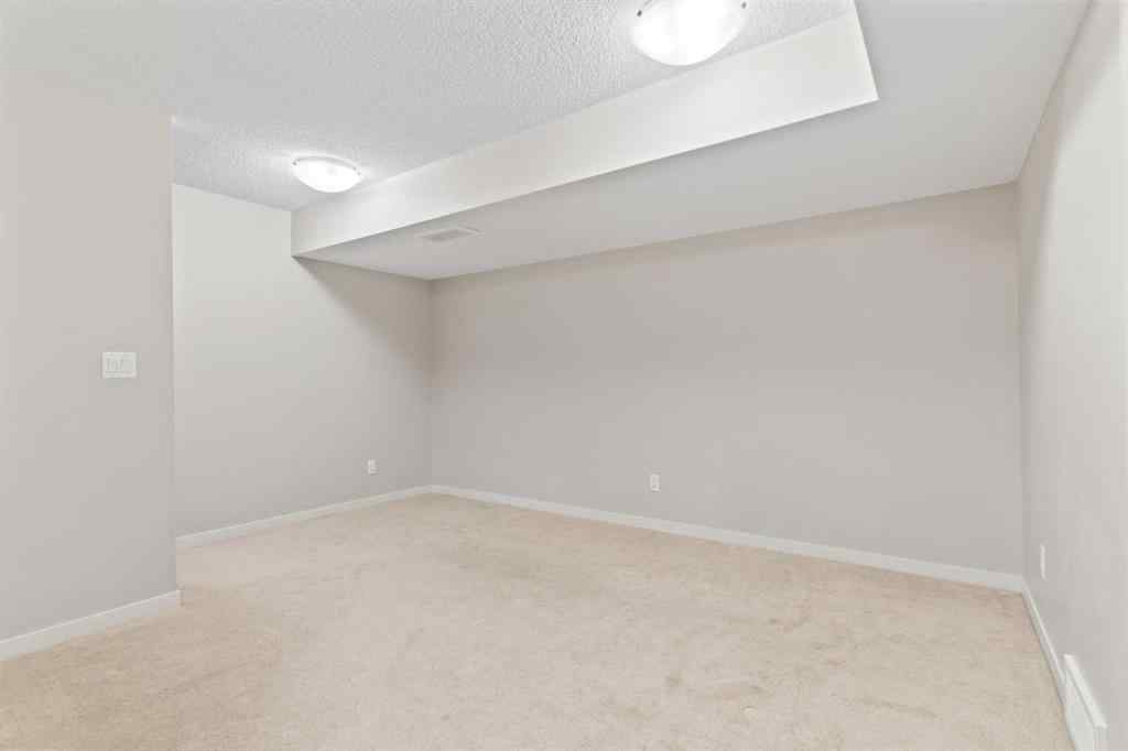 MLS® A2228923 - 77 Auburn Glen Common SE in Auburn Bay Calgary, Residential