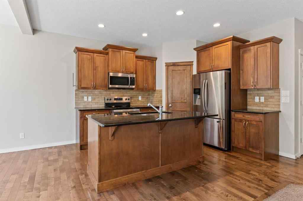 MLS® A2228923 - 77 Auburn Glen Common SE in Auburn Bay Calgary, Residential