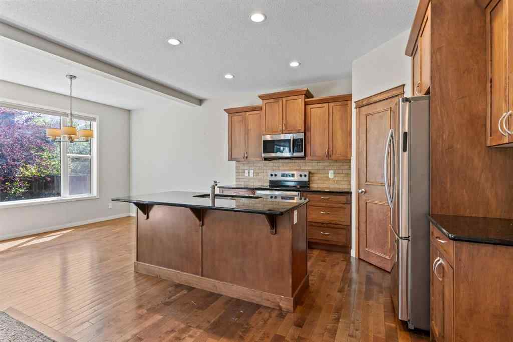 MLS® A2228923 - 77 Auburn Glen Common SE in Auburn Bay Calgary, Residential