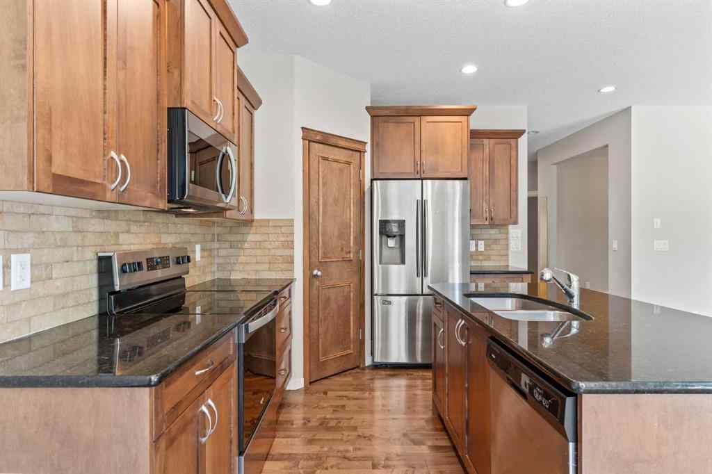 MLS® A2228923 - 77 Auburn Glen Common SE in Auburn Bay Calgary, Residential