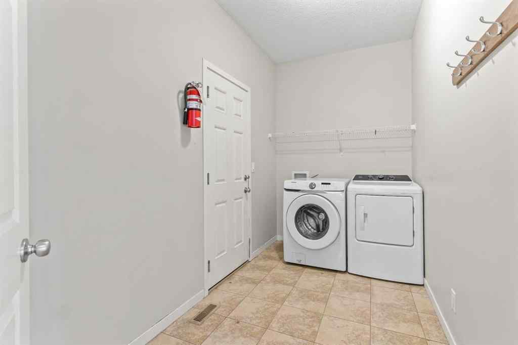 MLS® A2228923 - 77 Auburn Glen Common SE in Auburn Bay Calgary, Residential