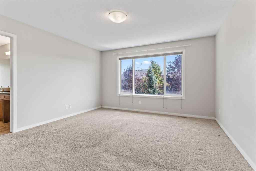 MLS® A2228923 - 77 Auburn Glen Common SE in Auburn Bay Calgary, Residential