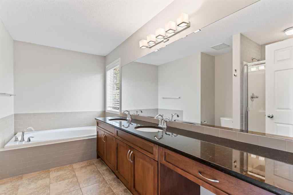 MLS® A2228923 - 77 Auburn Glen Common SE in Auburn Bay Calgary, Residential
