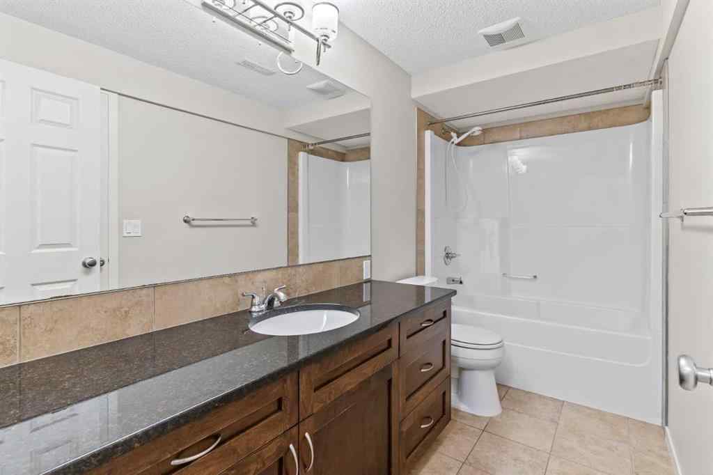 MLS® A2228923 - 77 Auburn Glen Common SE in Auburn Bay Calgary, Residential