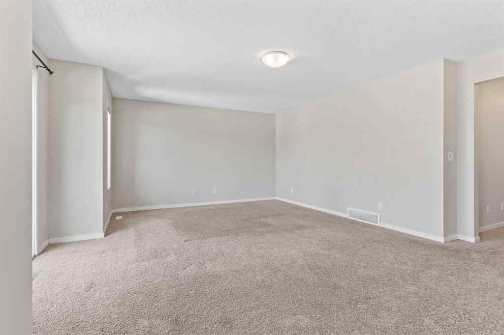 MLS® A2228923 - 77 Auburn Glen Common SE in Auburn Bay Calgary, Residential