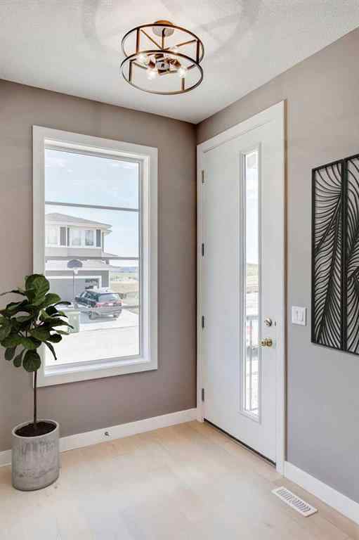 MLS® A2228997 - 92 Sundown Crescent  in Sunset Ridge Cochrane, Residential