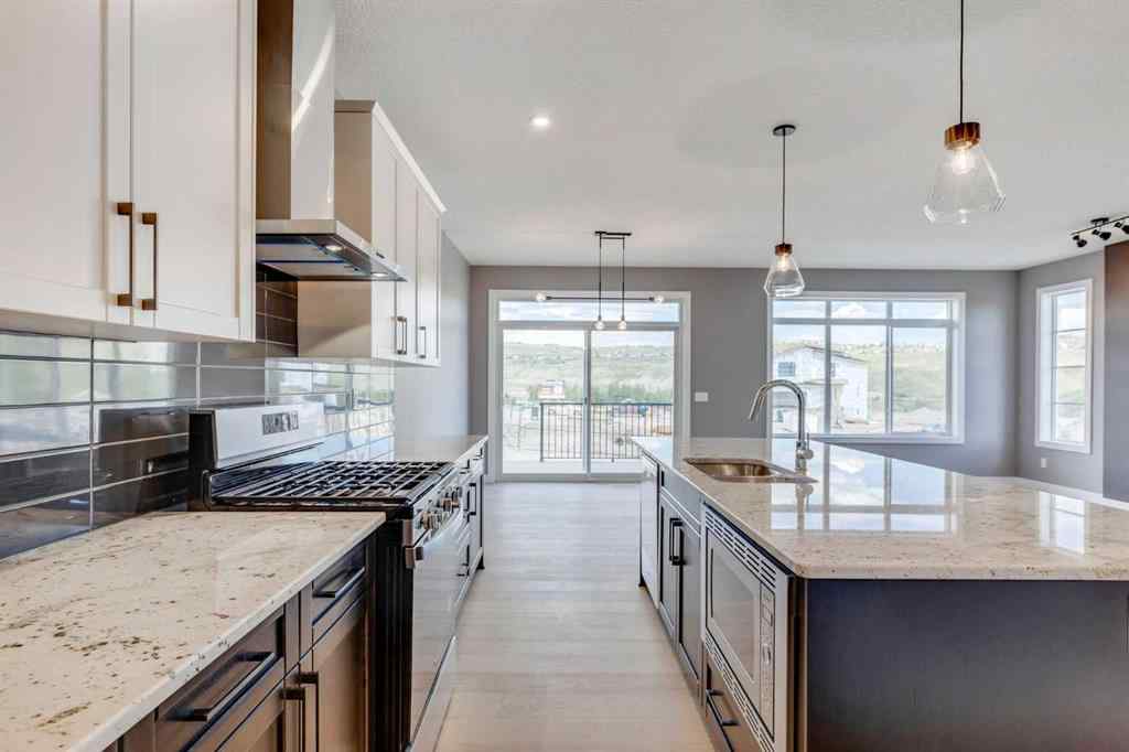 MLS® A2228997 - 92 Sundown Crescent  in Sunset Ridge Cochrane, Residential