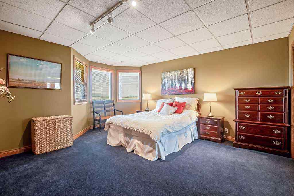 MLS® A2229058 - Unit #100 182029 174 Avenue W in NONE Priddis, Residential