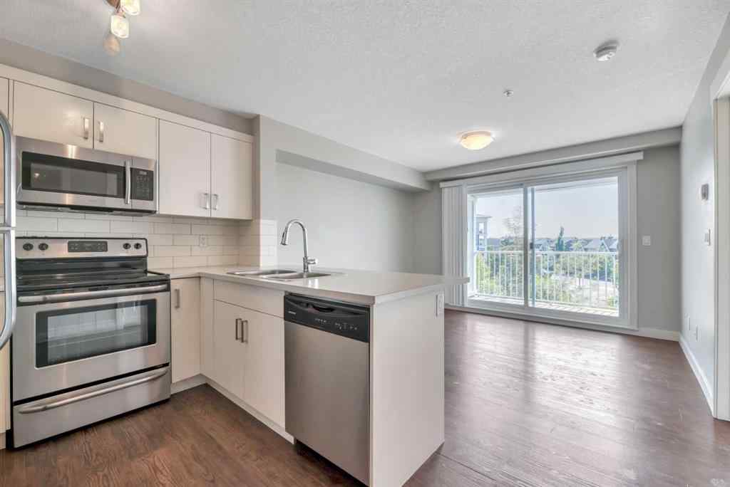 MLS® A2229060 - Unit #320 130 Auburn Meadows View SE in Auburn Bay Calgary, Residential