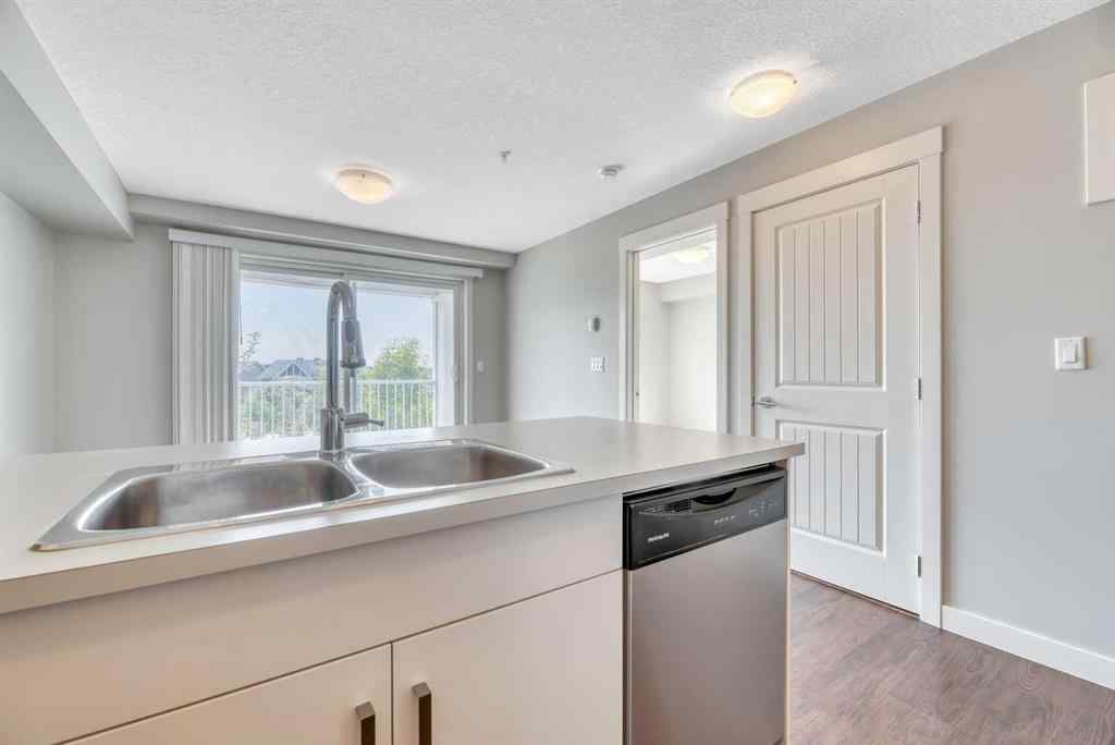 MLS® A2229060 - Unit #320 130 Auburn Meadows View SE in Auburn Bay Calgary, Residential