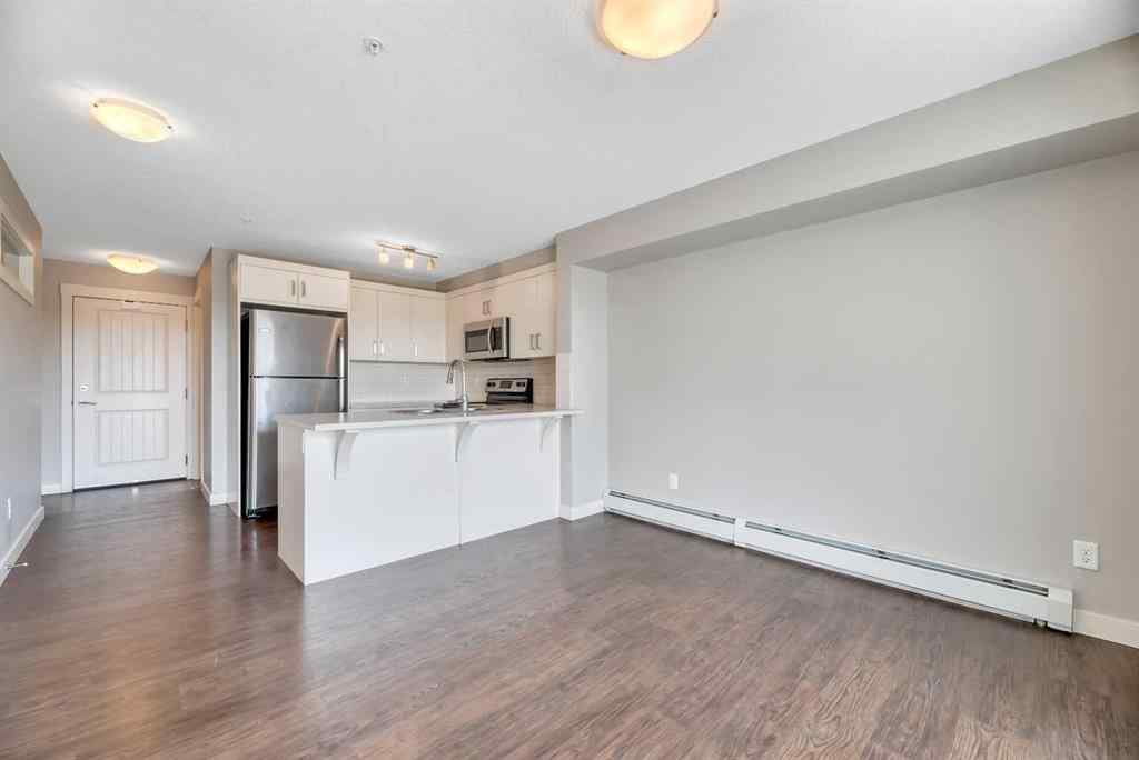 MLS® A2229060 - Unit #320 130 Auburn Meadows View SE in Auburn Bay Calgary, Residential
