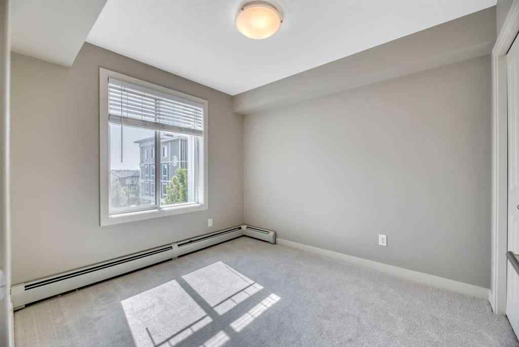 MLS® A2229060 - Unit #320 130 Auburn Meadows View SE in Auburn Bay Calgary, Residential