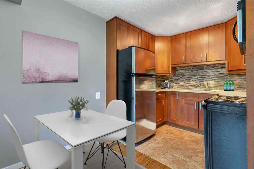 MLS® A2229065 - Unit #104B 5601 Dalton Drive NW in Dalhousie Calgary, Residential