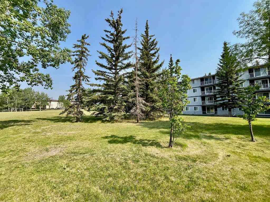 MLS® A2229065 - Unit #104B 5601 Dalton Drive NW in Dalhousie Calgary, Residential