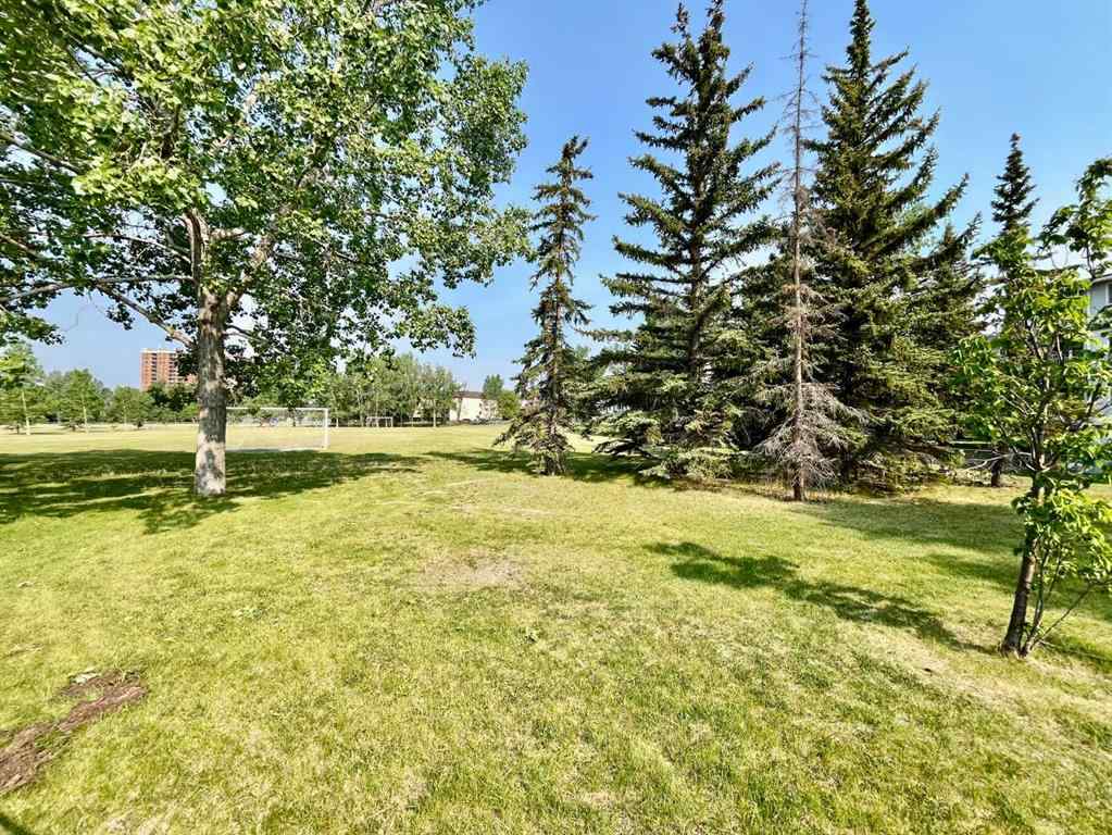 MLS® A2229065 - Unit #104B 5601 Dalton Drive NW in Dalhousie Calgary, Residential