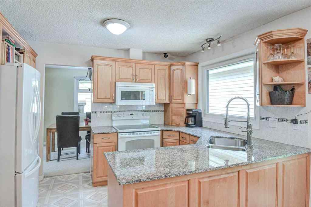 MLS® A2229311 - 623 Lake Simcoe Close SE in Lake Bonavista Calgary, Residential