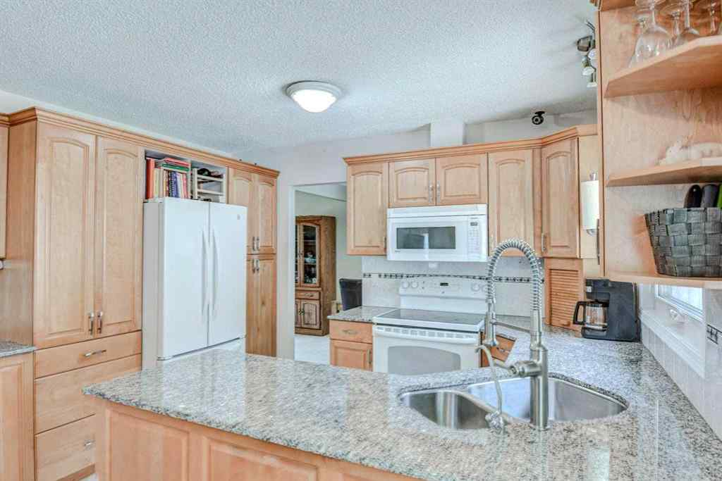 MLS® A2229311 - 623 Lake Simcoe Close SE in Lake Bonavista Calgary, Residential
