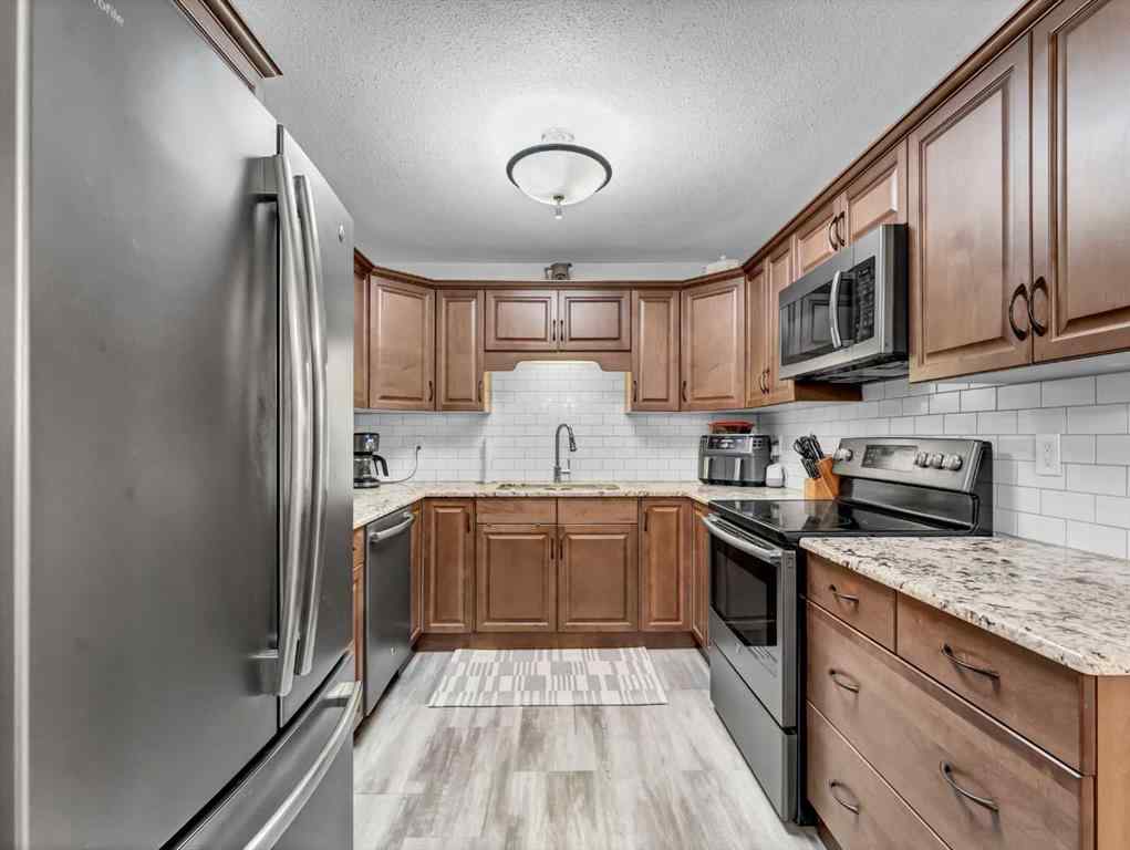 MLS® A2229352 - Unit #1 1165 16 Street NE in Northeast Crescent Heights Medicine Hat, Residential