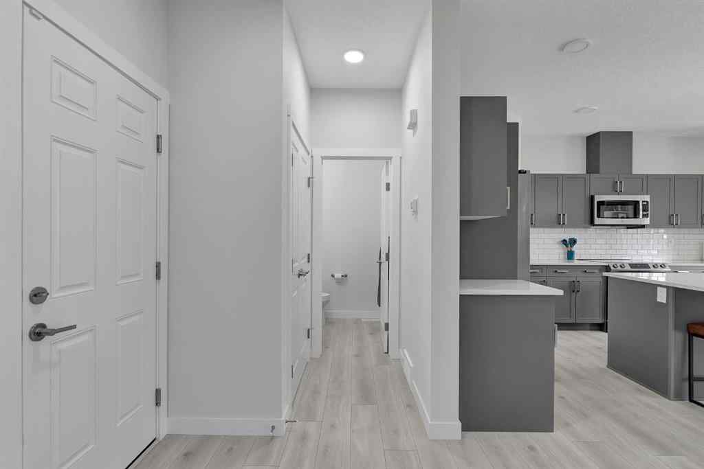 MLS® A2229386 - 59 Belgian Crescent  in Heartland Cochrane, Residential