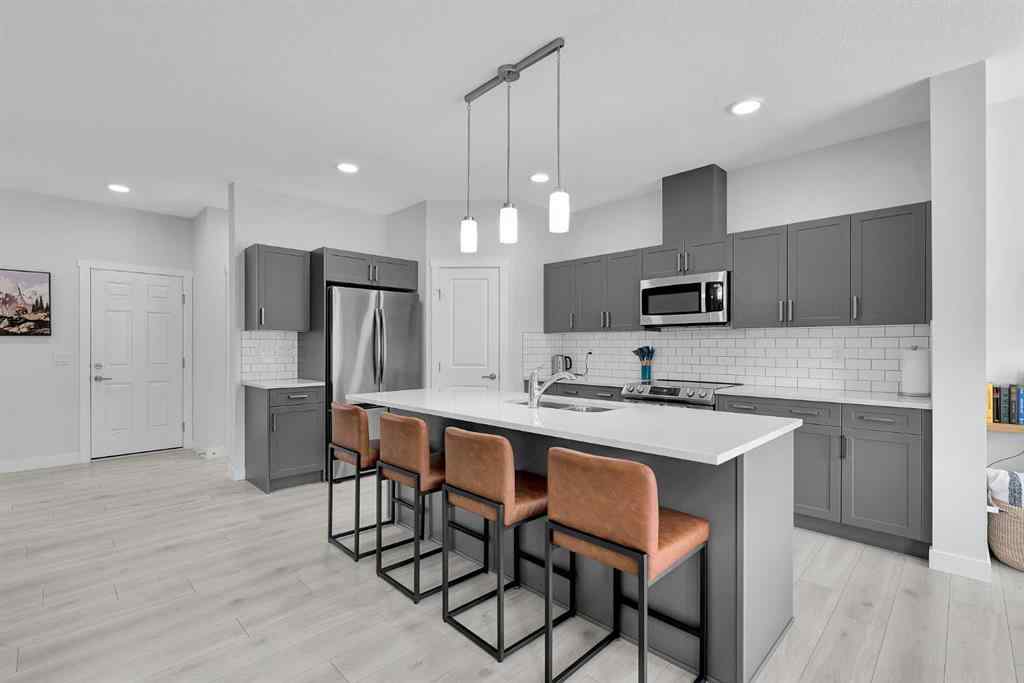 MLS® A2229386 - 59 Belgian Crescent  in Heartland Cochrane, Residential