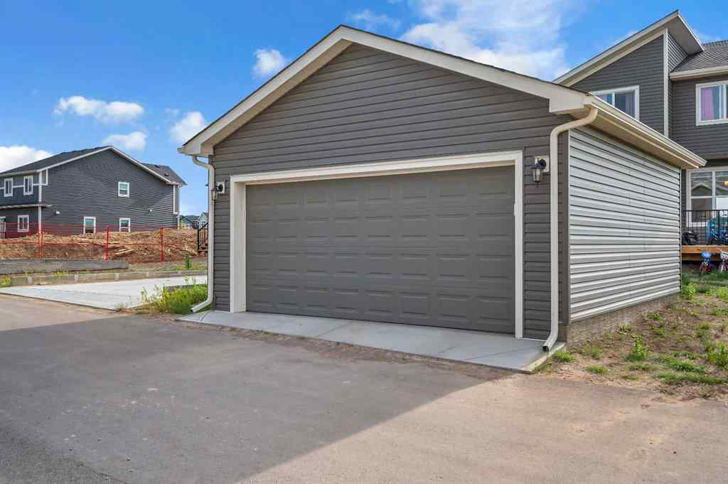 MLS® A2229457 - 1422 Midtown Link SW in Midtown Airdrie, Residential