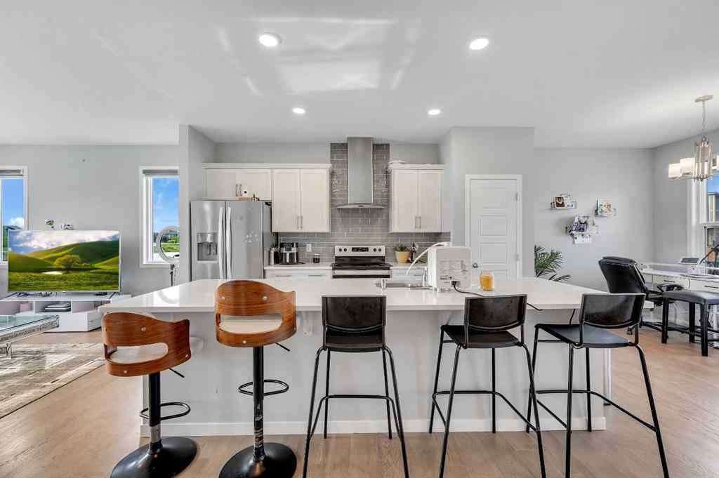 MLS® A2229457 - 1422 Midtown Link SW in Midtown Airdrie, Residential