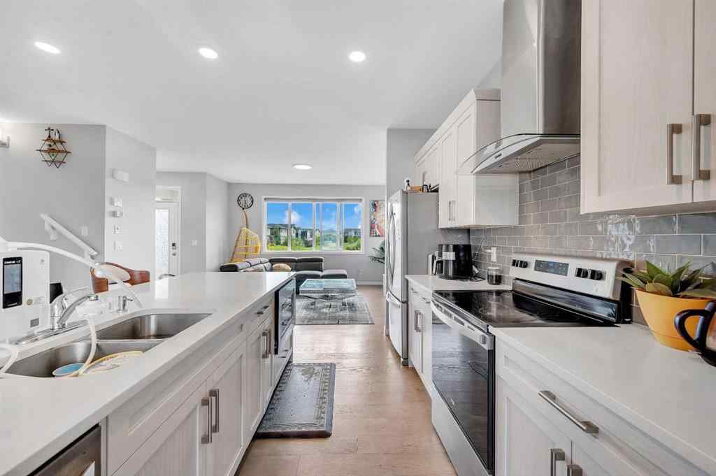 MLS® A2229457 - 1422 Midtown Link SW in Midtown Airdrie, Residential