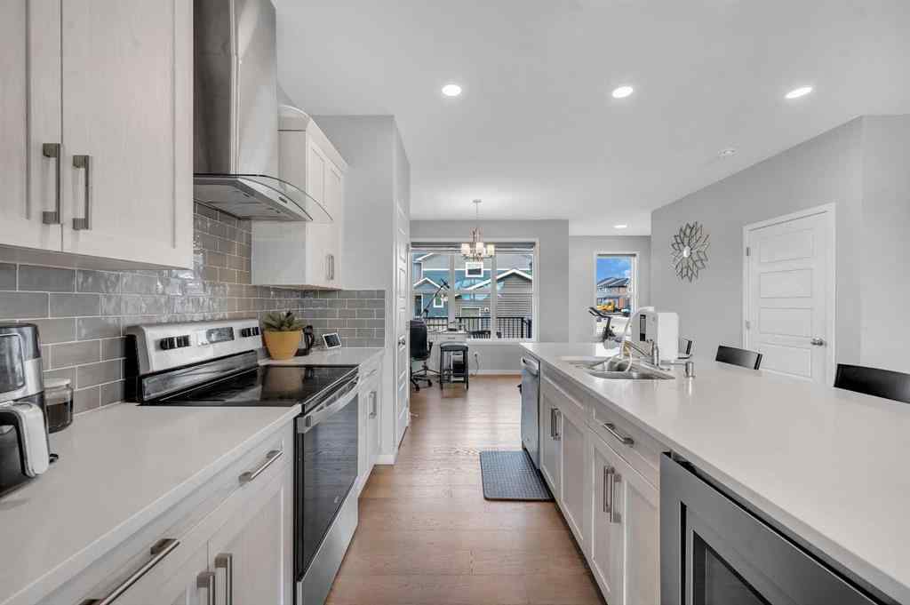 MLS® A2229457 - 1422 Midtown Link SW in Midtown Airdrie, Residential