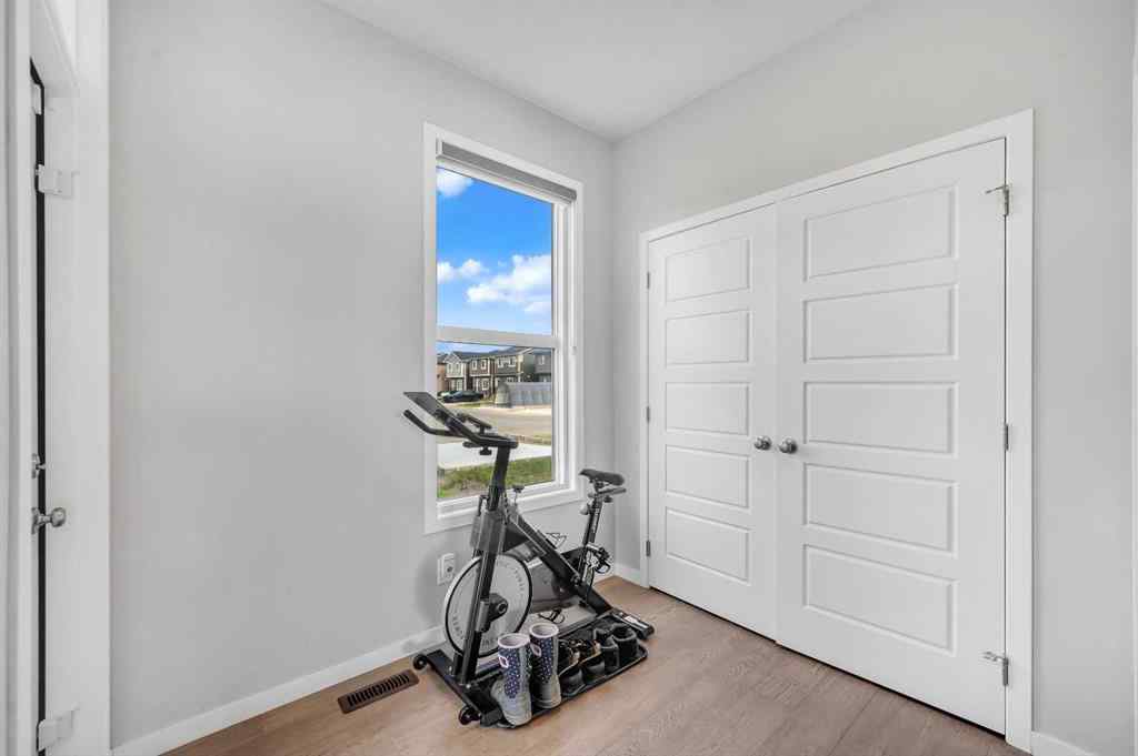 MLS® A2229457 - 1422 Midtown Link SW in Midtown Airdrie, Residential