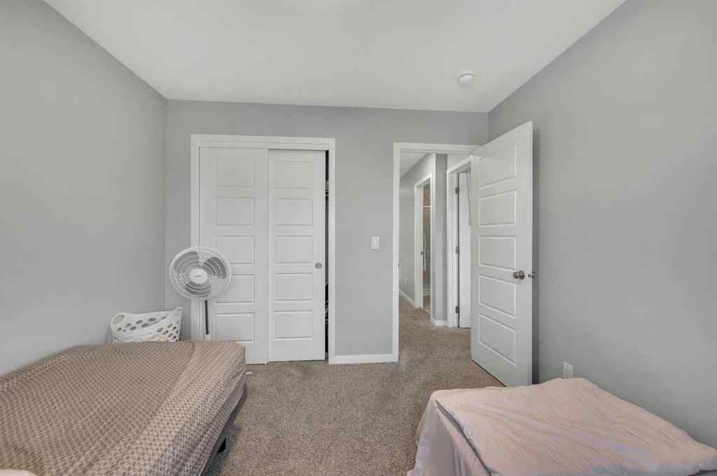 MLS® A2229457 - 1422 Midtown Link SW in Midtown Airdrie, Residential