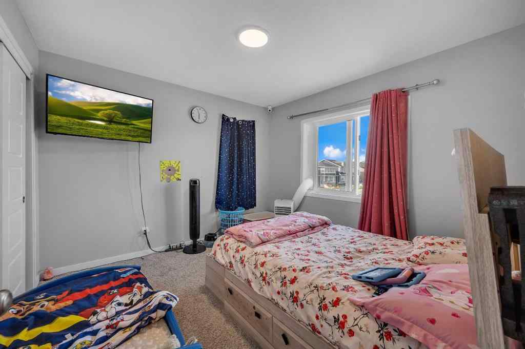 MLS® A2229457 - 1422 Midtown Link SW in Midtown Airdrie, Residential