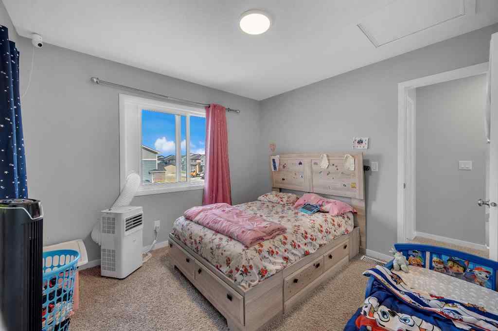 MLS® A2229457 - 1422 Midtown Link SW in Midtown Airdrie, Residential
