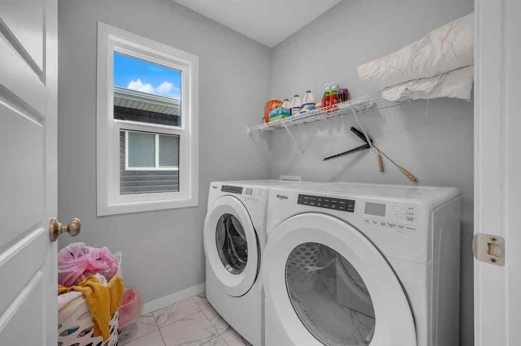 MLS® A2229457 - 1422 Midtown Link SW in Midtown Airdrie, Residential