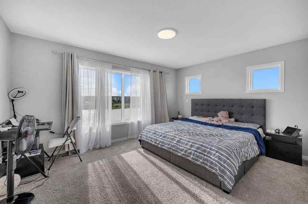 MLS® A2229457 - 1422 Midtown Link SW in Midtown Airdrie, Residential