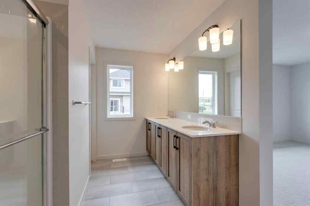 MLS® A2229618 - 807 Bayview Terrace SW in Bayview Airdrie, Residential