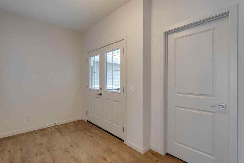 MLS® A2229618 - 807 Bayview Terrace SW in Bayview Airdrie, Residential
