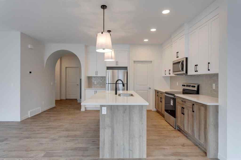 MLS® A2229618 - 807 Bayview Terrace SW in Bayview Airdrie, Residential