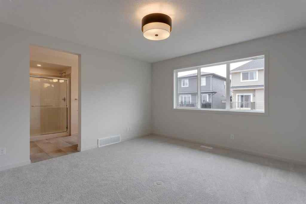 MLS® A2229618 - 807 Bayview Terrace SW in Bayview Airdrie, Residential