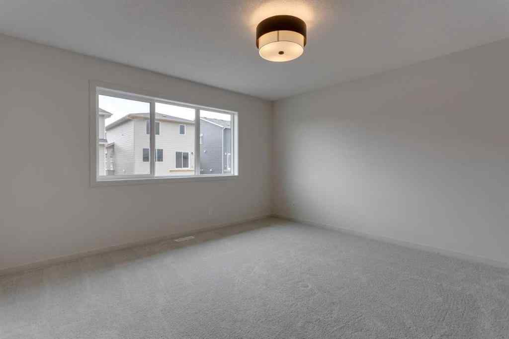 MLS® A2229618 - 807 Bayview Terrace SW in Bayview Airdrie, Residential